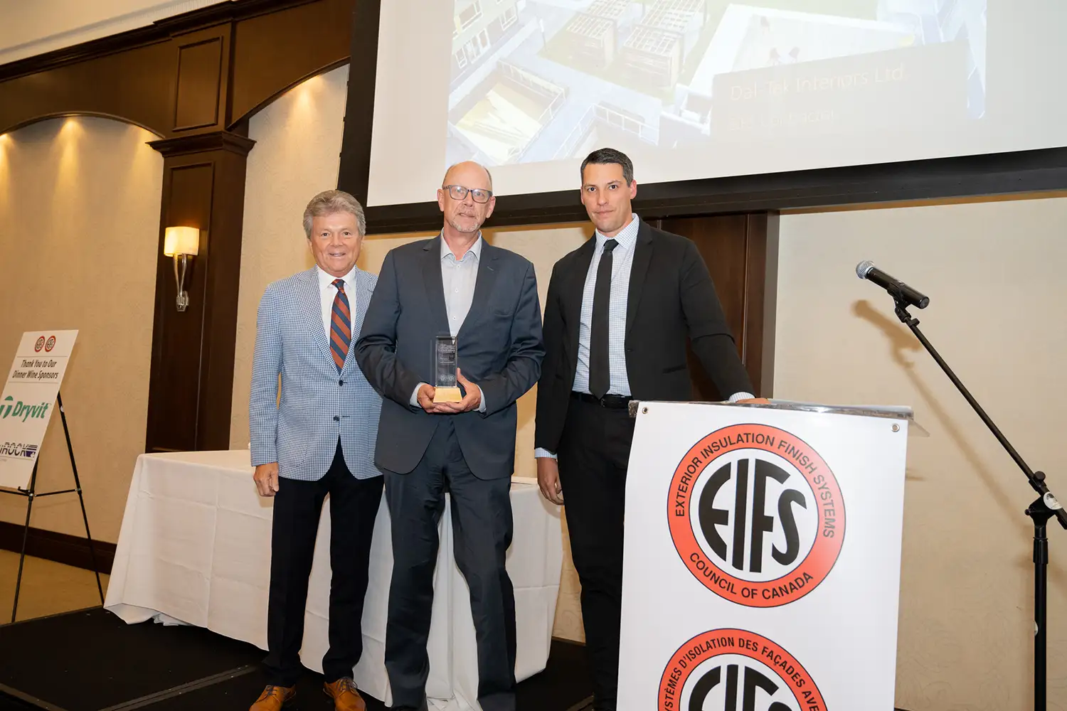 From Left: John M. Garbin, (President/CEO, ECC), Douglas Lang (NORR Architects Engineers and Planners), Nick Swerdfeger (ECC Judging Panel chair, Barry Bryan Associates) - EIFS Council of Canada