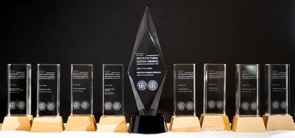 Picture of several awards on a table for the 2023 Architectural Design Awards - EIFS Council of Canada