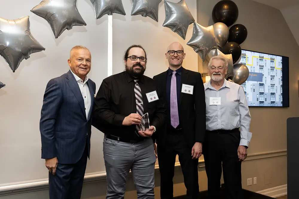 From Left: John M. Garbin, (President/CEO, ECC), Joel Tranq (Affinity Architecture Inc.), Evan Hanson (Affinity Architecture Inc.), Joe Somfay (Joe Somfay Architect)